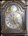 Cooper and Hedge, Colchester, c.1735 Miniature longcase (Grandmother) clock) This clock has an eight day striking movement with a twelve inch arched brass dial. The original blue lacquer case is of diminutive height and still retains its original double skirt.  True miniature longcase clocks from the 18th century are exceedingly rare and highly prized.  